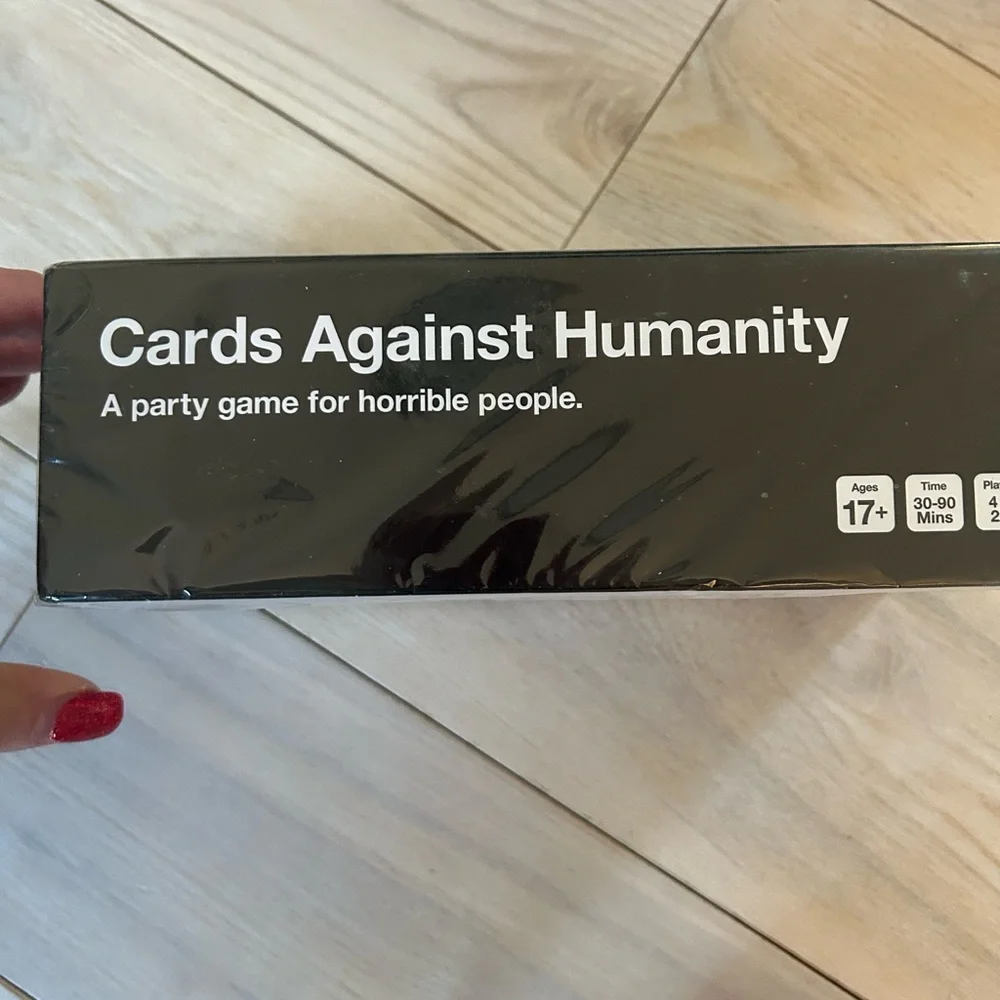 CARDS AGAINST HUMANITY, never opened! - Picture 2 of 9